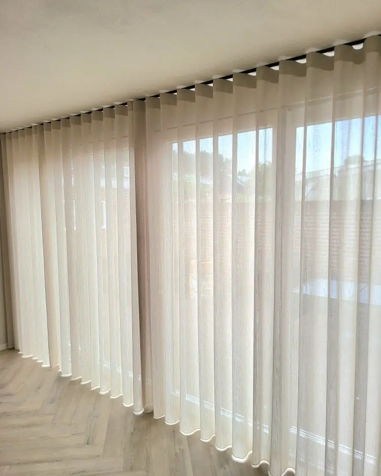 Sheer Curtains UAE Online softly filtering daylight in a Dubai living room