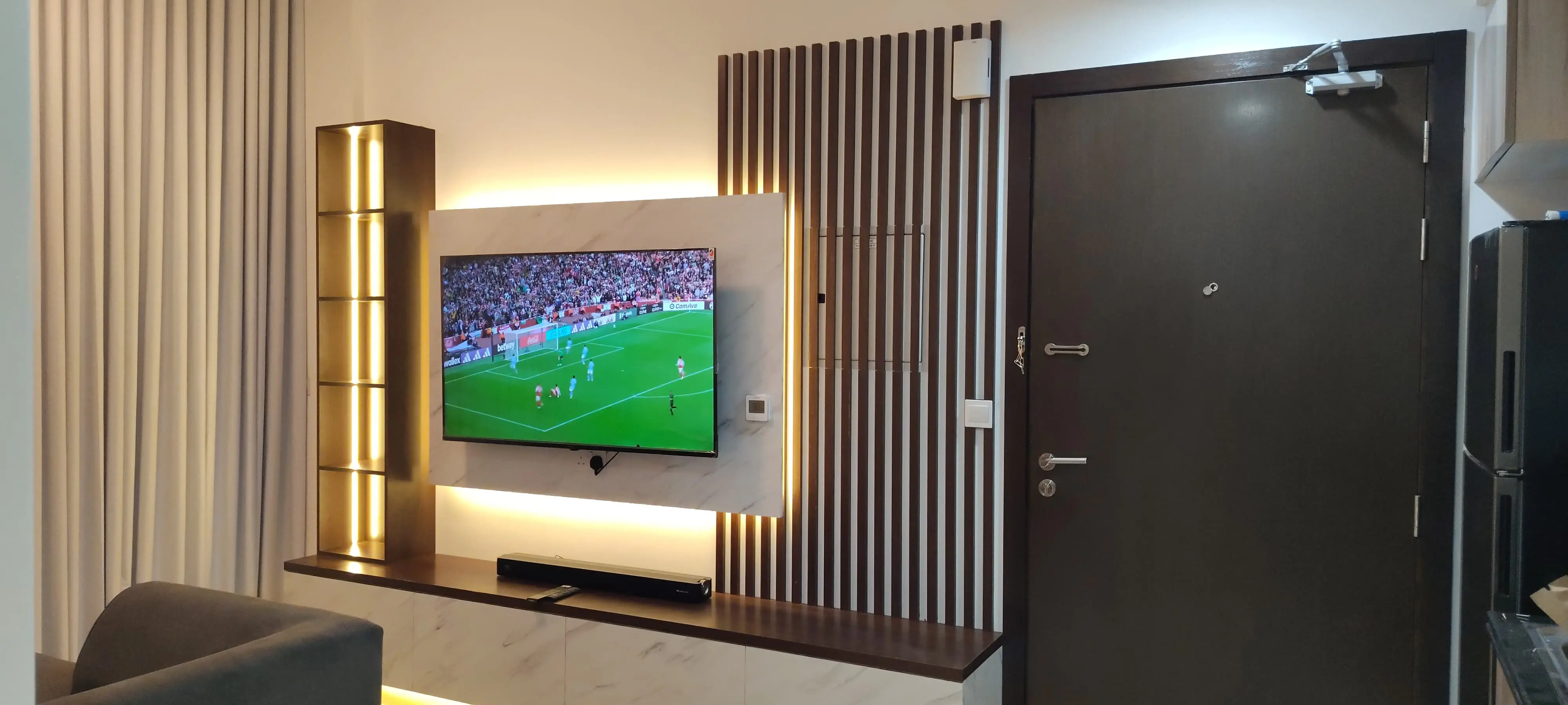 TV media wall and curtains installation in Damac Hills Dubai (55) TV media wall and curtains installation in Damac Hills Dubai (55)